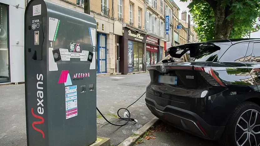 nexans charger connected to black car in charleville mezieres