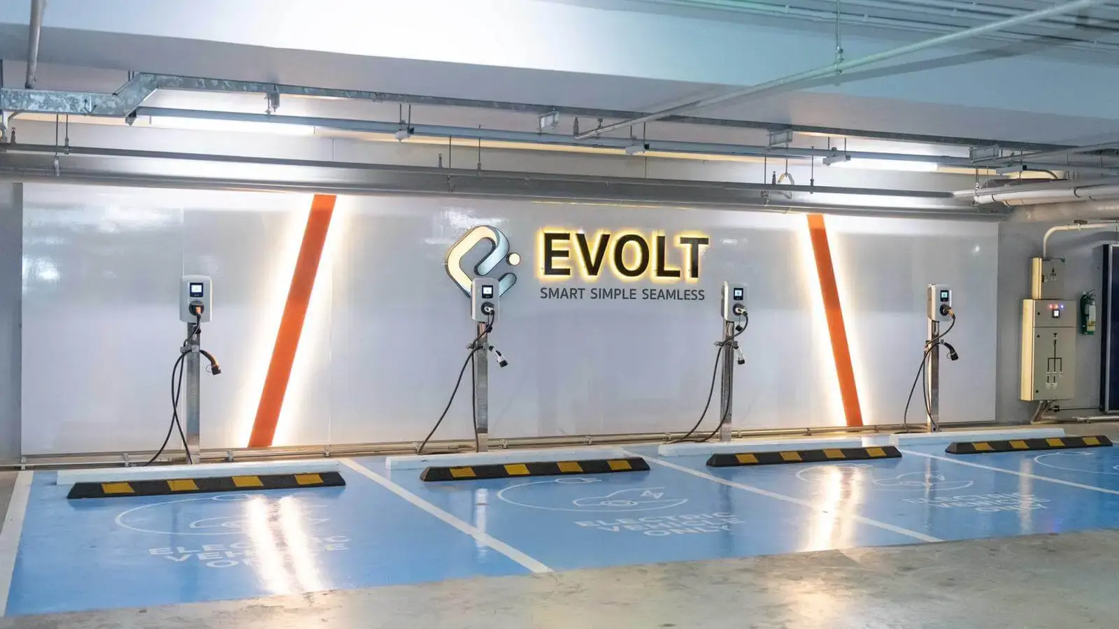 Evolt AC chargers in a parking garage